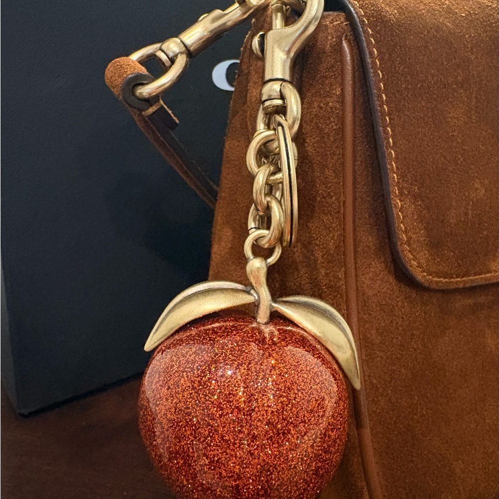 Coach Peach bag charm
